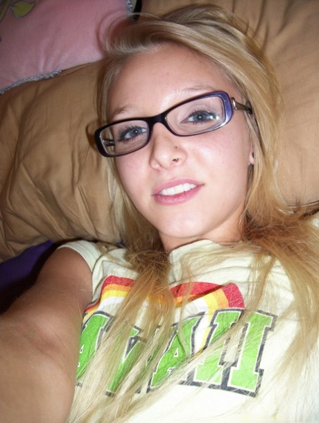 Nerdy teen girl takes selfies of her exposed tits and micro shorts 73222292