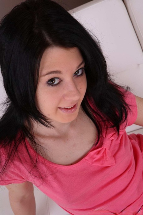 Young brunette Andrea masturbates on a futon while wearing sneakers 18153827