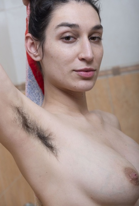 Amateur model Janetta shows her hairy armpits and beaver while taking a bath 49986818