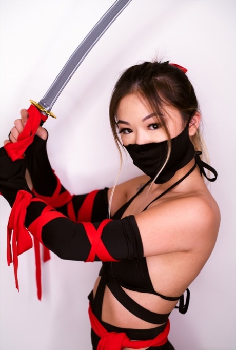Petite Asian teen Lulu Chu wields a samurai sword before fucking 35890861