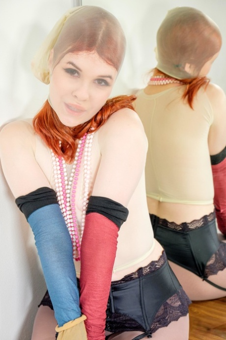 Pale redhead Kaira adorns herself in nylons while wearing glasses 88684034
