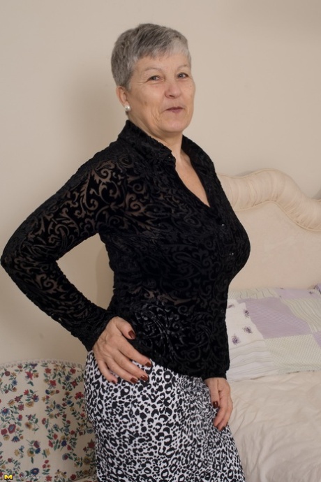 Grey haired gran from the UK strips to her silk underwear and nylons 22315762