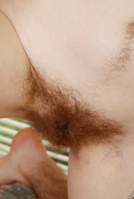 Ugly lassie with unshaven armits undressing and spreading her hairy gash 38187234